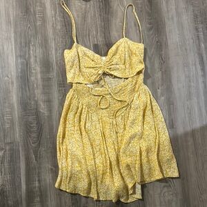 Yellow boutique romper with cutout
